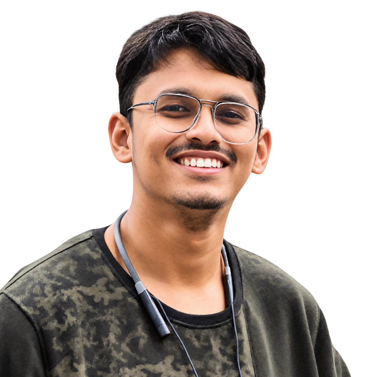 Nil Borah smiling in glasses and a patterned shirt